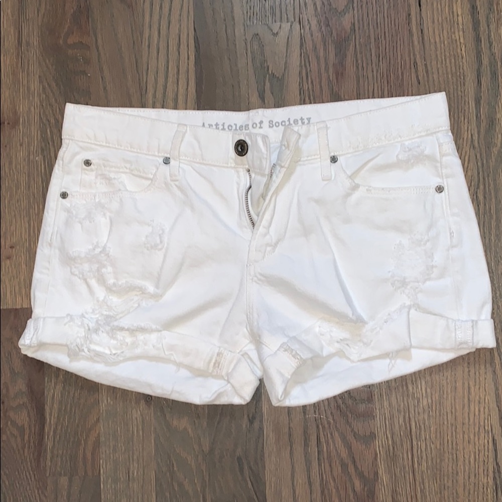 White distressed denim shorts